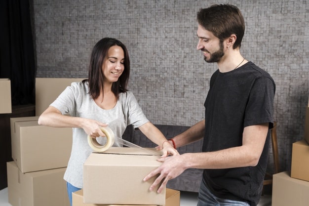 Couple are packing boxes